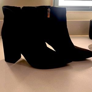 Black booties lightly worn